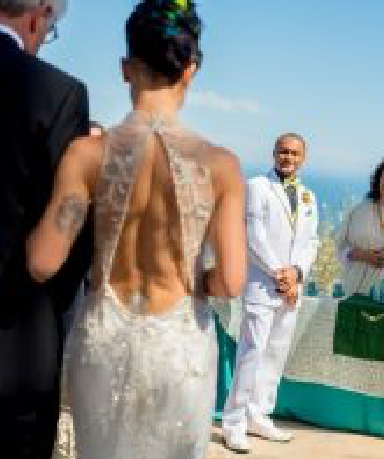 4-100 Bride walking down the aisle with groom and father