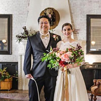 Bride and Groom with their dog as ringbearer